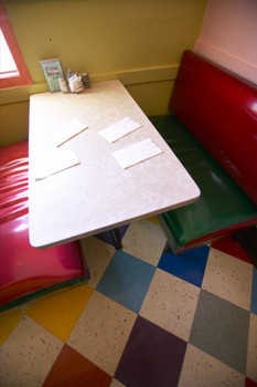 From the line in the poem, 'sit across Him in the booth' comes this picture of a booth in a restaurant.