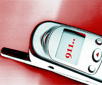 A picture of a cell phone with the number 911 dialed up on it.